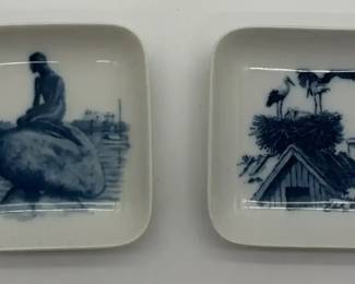 Two Royal Copenhagen porcelain decorative aprox 3 in dishes with blue and white motifs.