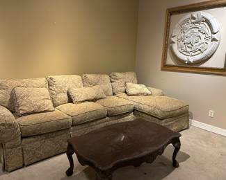 Contemporary sofa and chaise combo sofa in damask,  neat frame with interesting round faux plaster art
