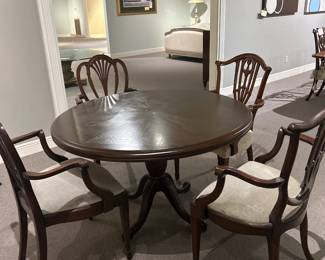 Round dining table set of English chairs 