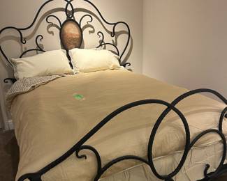 Hand forged iron bed with painted panel 