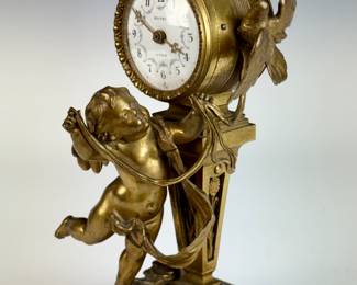 Antique bronze desk clock with cherub