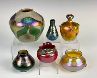 Rare collection of Tiffany Studios miniature cabinet vases. All signed
