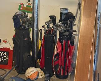 Multiple sets of golf clubs