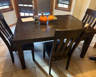 Kitchen dining table with chairs for four