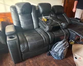 Multiple sets of leather recliners