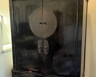 Stunning Antique Black Lacquer oriental Wedding Cabinet w/ large circular brass medallion & ornate pulls