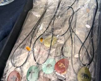 Assorted etched stones on leather cords