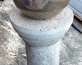 Gazing ball on cement stand