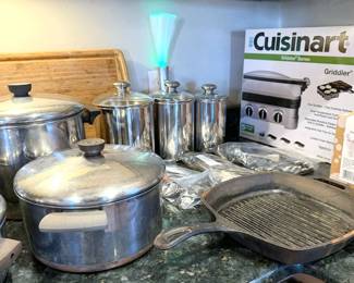Assorted cookware, including Lodge + Wagner cast iron pans, and NIB Cuisinart Griddler