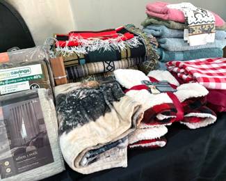 Assorted curtain panels (NIB), throw blankets, towels + linens