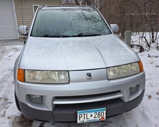 SATURN: 200,000 PLUS MILES. NEEDS WORK. 