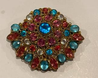 Passionate vintage costume jewelry collector. Over 400 vintage brooches alone!