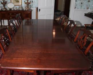 "Tell City" table and 8 chairs. Table w/4 leaves & custom pads