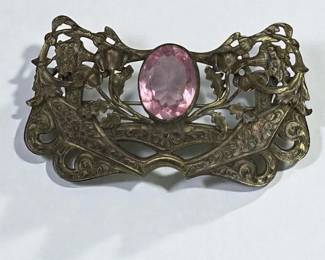 Art Nouveau sash pin with a large pink center stone