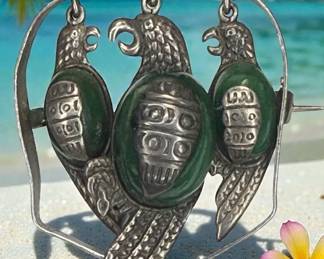 Sterling silver threeparrot brooch with green gemstone inlay