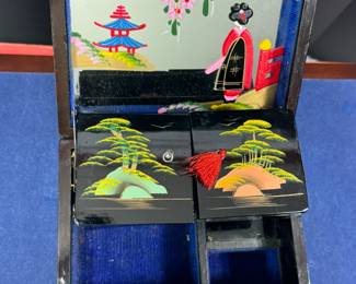 Japanese black lacquer, abalone and mother of pearl musical jewelry box 