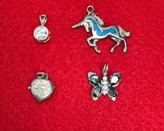 four piece Sterling silver pendant set