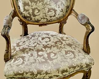 Late 1800s French Fauteuil with aged gilding and lovely taupe brocade.