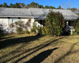 This house is for-sale . It will have to be moved . 