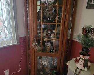 Lighted corner cabinet.  Full of collectibles.