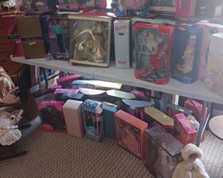 Over 60 Barbie Dolls in Boxes