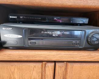 Sony DVD Player. Sharp VHS Player. 
