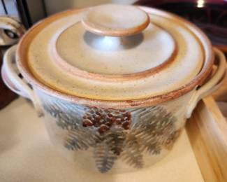 Lots of Pottery Bowls and Cookware. 