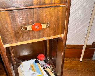 Art Deco maple cabinet with classic bakelite handles