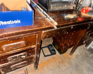 Old scruffy desk with treasures within
