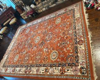 9'2 x 12 hand tied wool rug Made in Iran..  Worn in one spotl  Otherwise in exceptional condition,