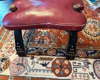 Old and worn original camel stool.  Lots of life left.