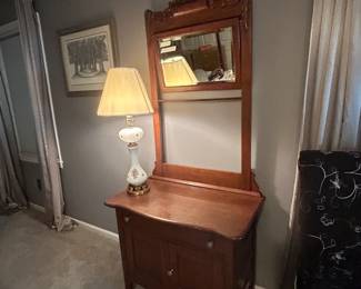 Beautiful oak dresser/wash stand.  QUALITY antique piece.  Nice lamp and art work.