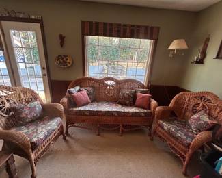 Nice three piece wicker sunroom set.  Included pillows and cushions.