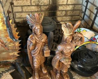 Hand crafted ceramic glazed Indian chief and squaw.