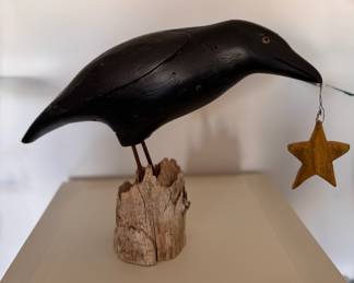 Joe Vokelich (American, Contemporary) Folk Art Crow with Star Mounted on Driftwood. 2002. Measures 18" W x 12" H. 