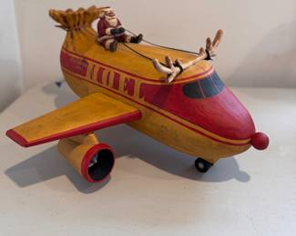 "Santa on Airplane Noel Express," Hand-Made Folk Art Santa by American Carver Bob Stebleton (Maine). 1996. Measures 10/5" W x 19.5" L. Photo 2 of 3. 