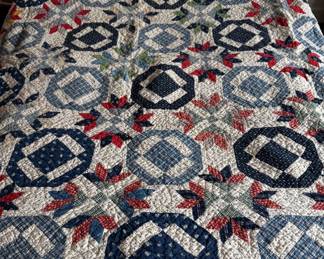 Garden Party Pattern Quilt with Blue, Red and White Fabrics. 