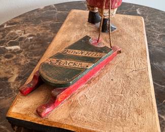 "Sledding Hill," Hand-Carved, Hand-Painted Folk Art Sculpture by Denise Calla (American, Contemporary). Measures 7" x 11"; 14" H. Photo 2 of 3. 