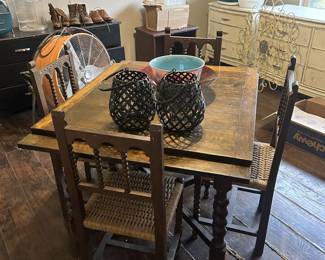 Antique Table that extends, 4+ chairs (some need seat repair)