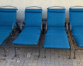 Set of Four Metal Outdoor Chaise Lounge Chairs with Blue Cushions