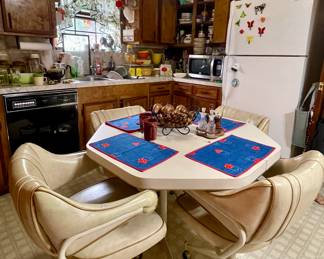 VINTAGE KITCHEN TABLE WITH 4 VINYL ROLLING CHAIRS, WHIRLPOOL REFRIGERATOR