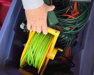 giant tub of extension cords 
