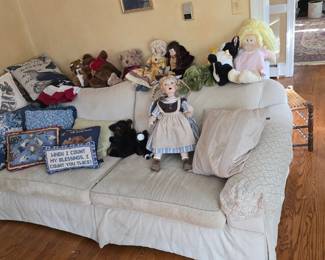 couch with dolls and more 