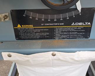 Delta table saw with extension.