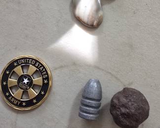 misc collectibles may be a old cannon ball 