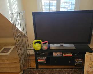 3DTV. With glasses. Entertainment center and more.