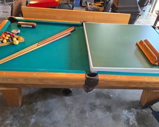 Connelly slate billiards table with ping pong and air hockey inserts. very nice table not one of the small cheap ones. comes with extras 