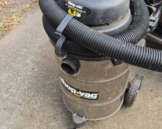 Shop vac on wheels.