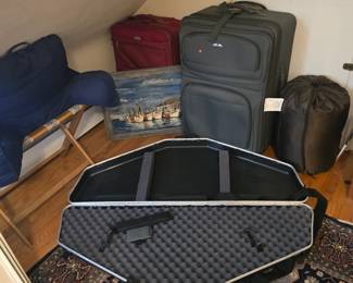 Luggage. An archery case.