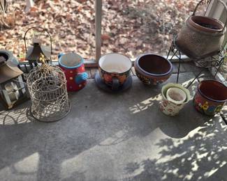 Lots of terra cotta planters, ceramic planters. And more.